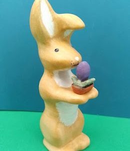 Big bunny figure with a flower