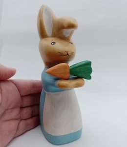 Big girl bunny figure with a carrot