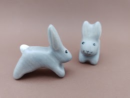 Jumping little bunny grey