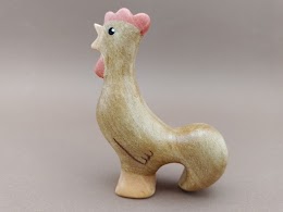 Brown crowing rooster