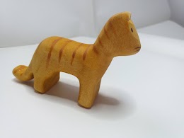 Hanging tailed cat