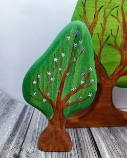 Blooming pear tree. the others side green. M
