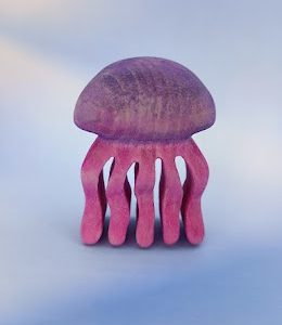 In the dark glow-in-the-dark jellyfish lila-pink